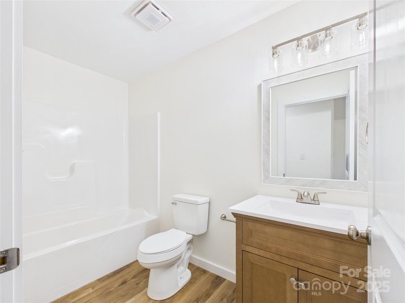 Furnished interior view inside a new home in , Valdese (Image 11).