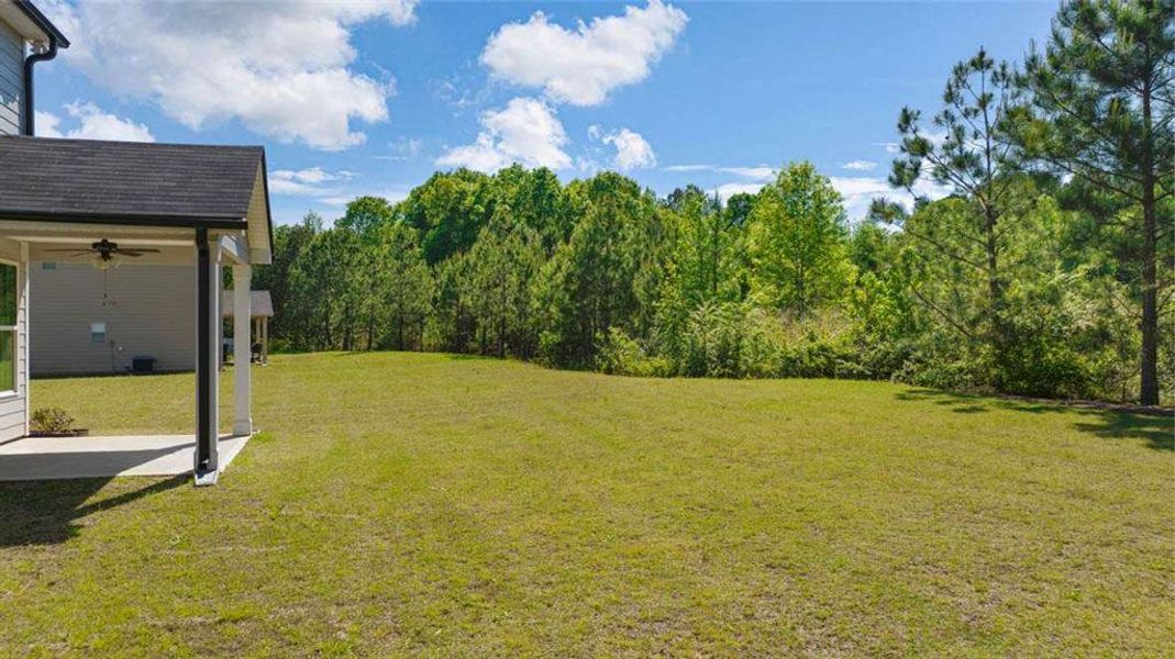 Exterior details and patio area of a home in Wildwood, Covington (Image 29). Exterior details and patio area of a home in Wildwood, Covington (Image 29).