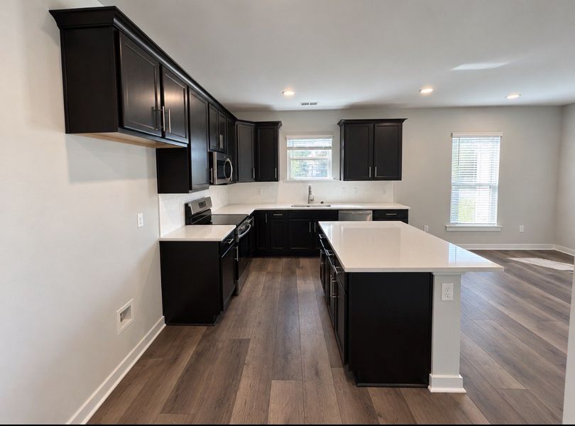 Furnished interior view inside a new home in Hickory Cove, Burns (Image 5).