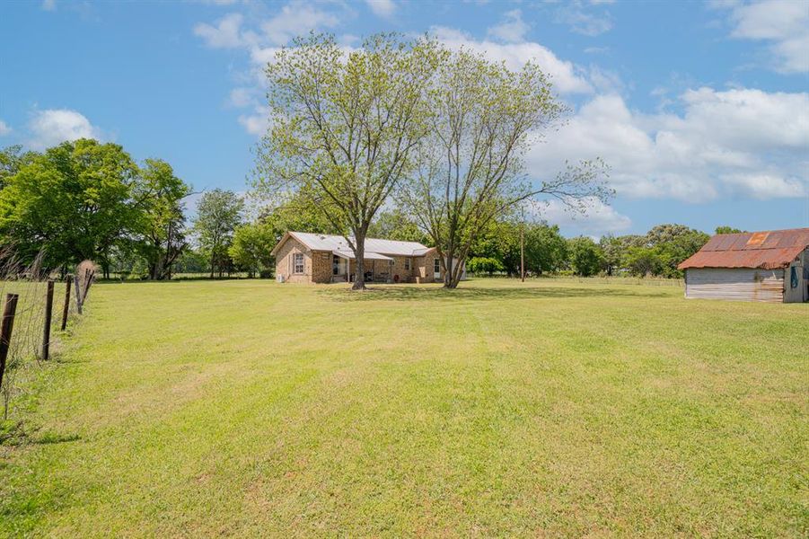Front exterior of a new home in , Leesburg, TX, highlighting curb appeal (Image 26).