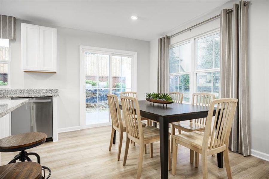 Furnished interior in a model home at Bell Creek Townhomes in Winnabow (Image 16).
