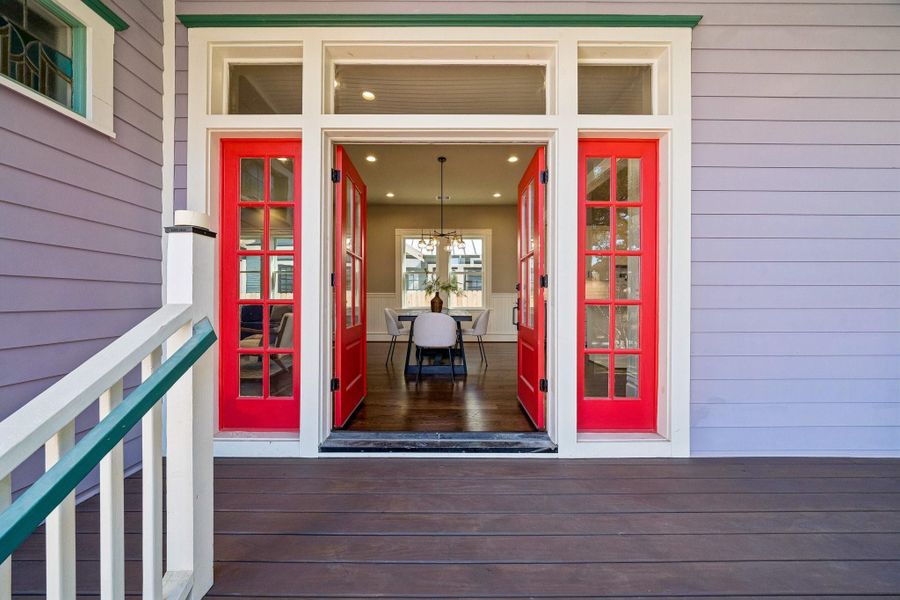 Step outside through the French doors onto the side porch. This inside-outside connection allows for sightlines and ease of entertaining! Note all sidelights and transom windows to allow for lots of natural light! Step outside through the French doors onto the side porch. This inside-outside connection allows for sightlines and ease of entertaining! Note all sidelights and transom windows to allow for lots of natural light!