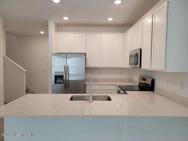 Furnished interior view inside a new home in , Jacksonville (Image 9).