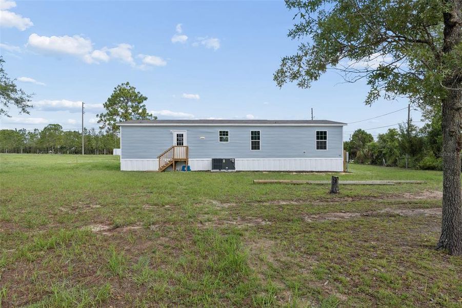 Exterior details and patio area of a home in , Brooksville (Image 20). Exterior details and patio area of a home in , Brooksville (Image 20).