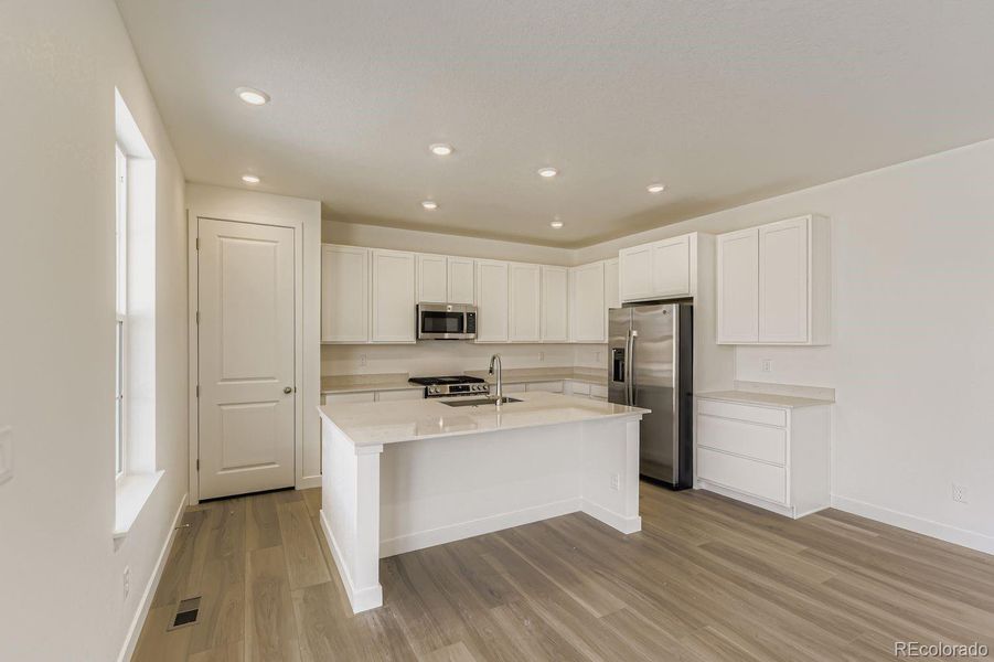 Furnished interior view inside a new home in Newlin Crossing: The Monarch Collection, Parker (Image 9).