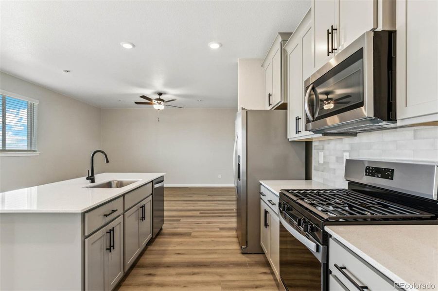 Furnished interior view inside a new home in Second Creek Farm, Commerce City (Image 5).