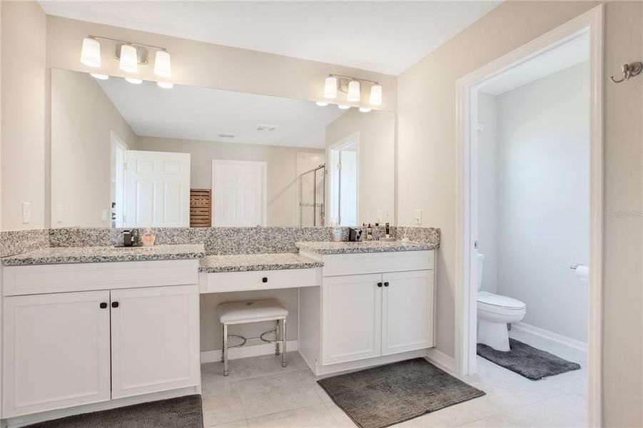 master bathroom with closet