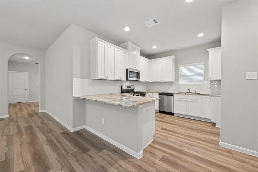 Furnished interior view inside a new home in , Huffman (Image 8).
