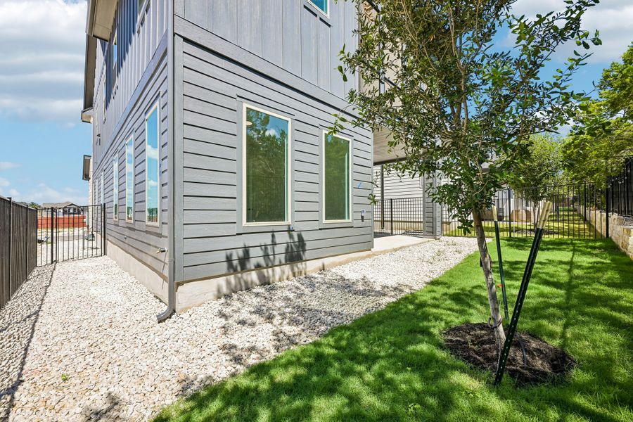 Exterior details and patio area of a home in Foxfield, Austin (Image 19).
