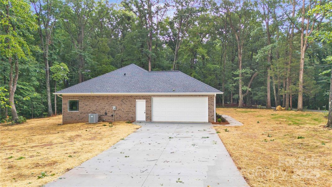 Exterior details and patio area of a home in , Mocksville (Image 24).