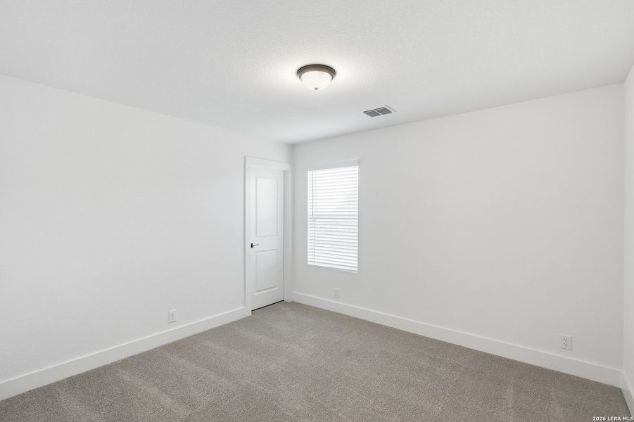 Spacious, unfurnished interior of a new home in Prominence, San Antonio (Image 27).