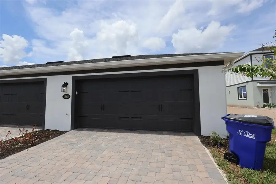 Exterior details and patio area of a home in Center Lake on the Park, St. Cloud (Image 18).