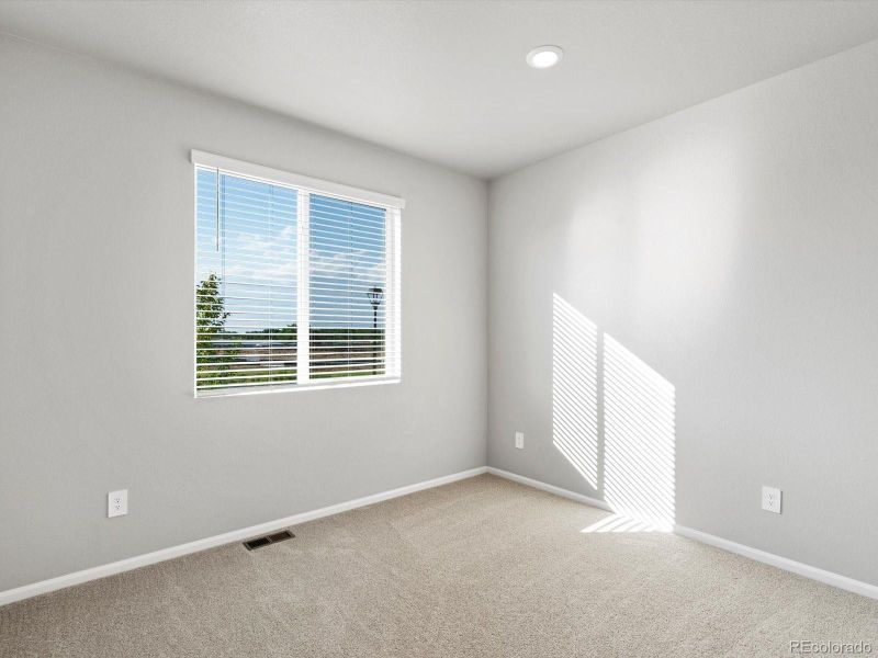 Spacious, unfurnished interior of a new home in Poudre Heights: The Lakes Collection, Windsor (Image 11).