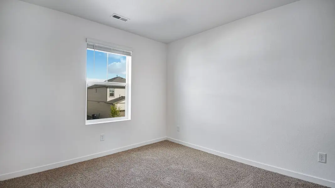 Spacious, unfurnished interior of a new home in Sky Ranch, Watkins (Image 16).