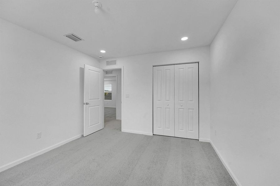 Spacious, unfurnished interior of a new home in Bent Creek: The Meadows Collection, Fort Pierce (Image 22).