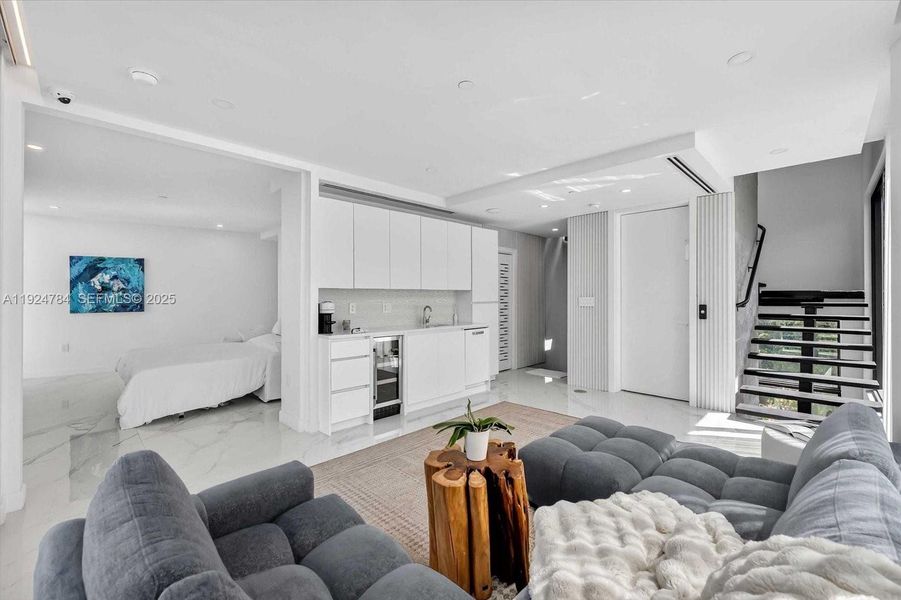 Furnished interior view inside a new home in , Miami Beach (Image 16). Furnished interior view inside a new home in , Miami Beach (Image 16).