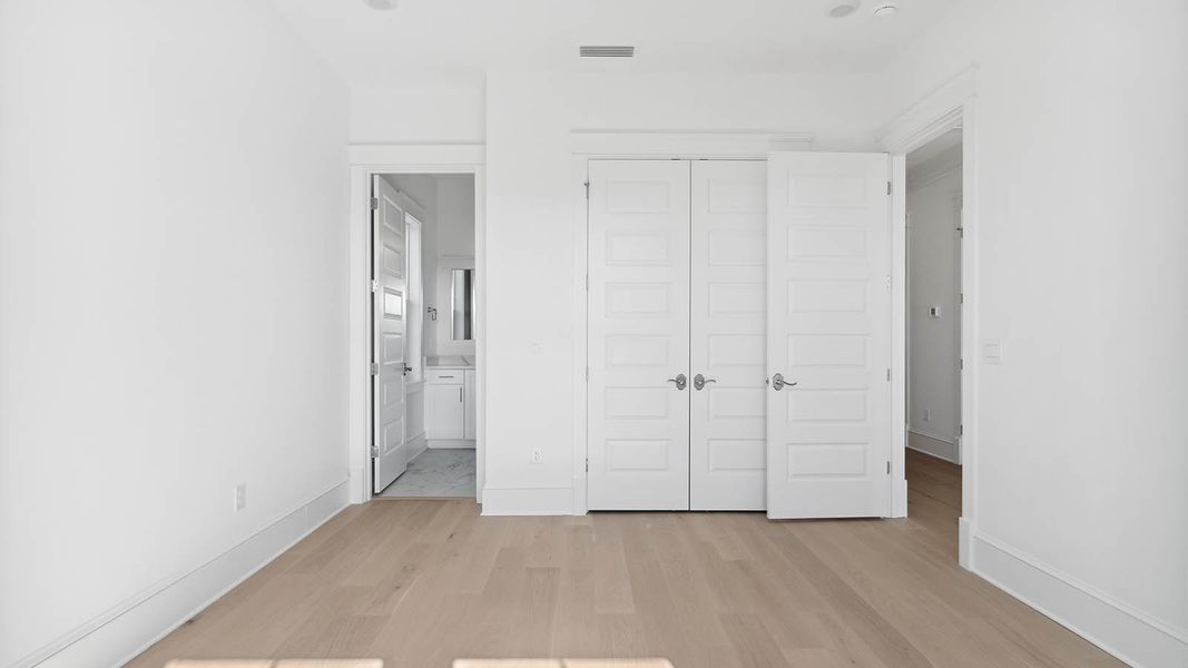 Representative unfurnished interior of a home built from the Cayman by D.R. Horton in Parkside, Santa Rosa Beach (Image 40).