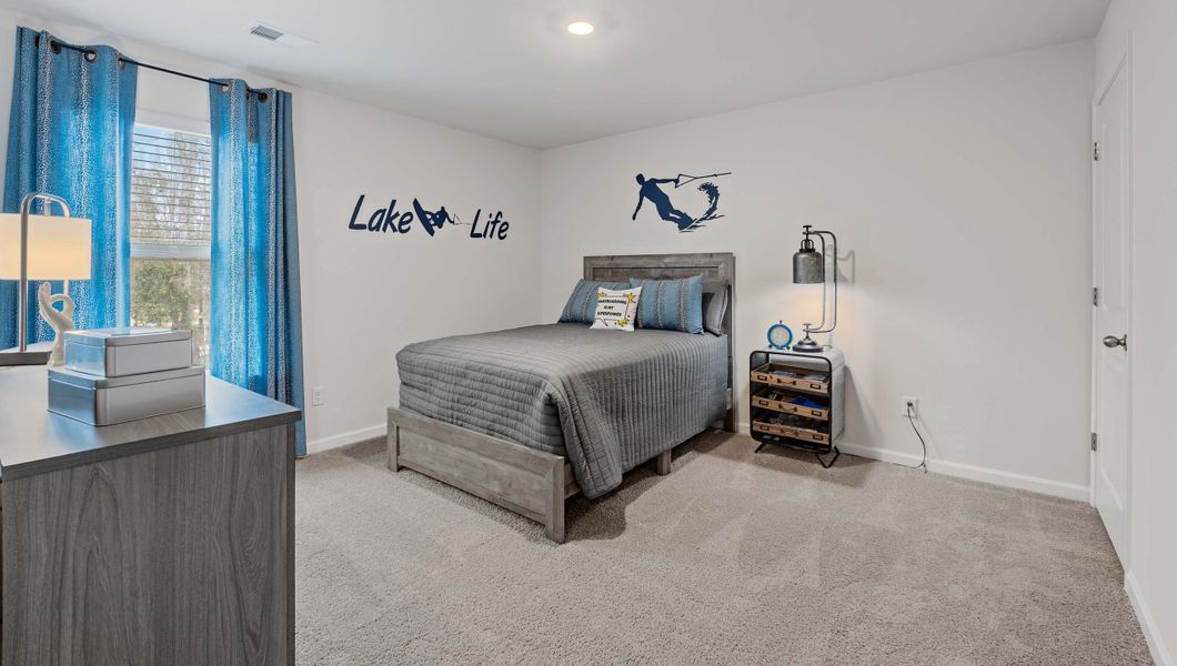 Furnished interior view inside a new home in Bentley Park, Greenwood (Image 25).