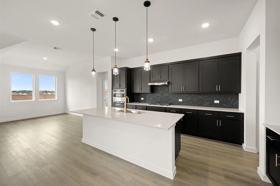 Open Kitchen-Dining Room featuring the Noir Collection Open Kitchen-Dining Room featuring the Noir Collection