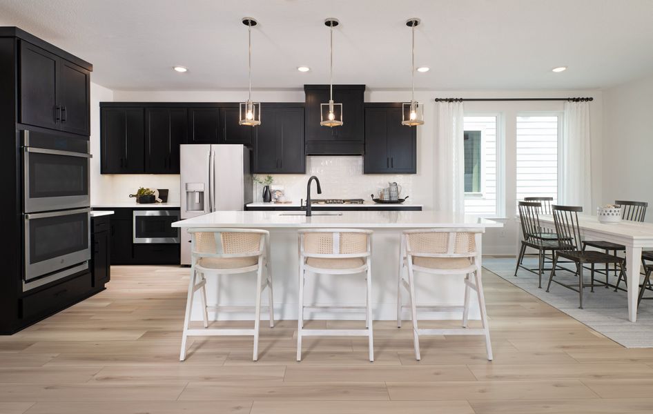 Representative furnished interior of a home built from the Victoria by Tri Pointe Homes in Painted Tree, McKinney (Image 18).