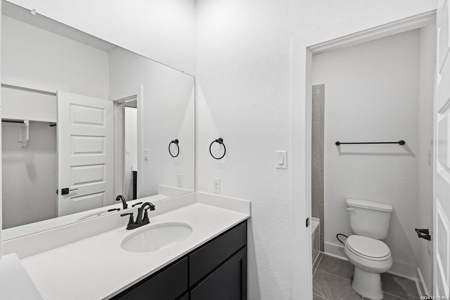 Furnished interior view inside a new home in Prominence Urban, San Antonio (Image 17).