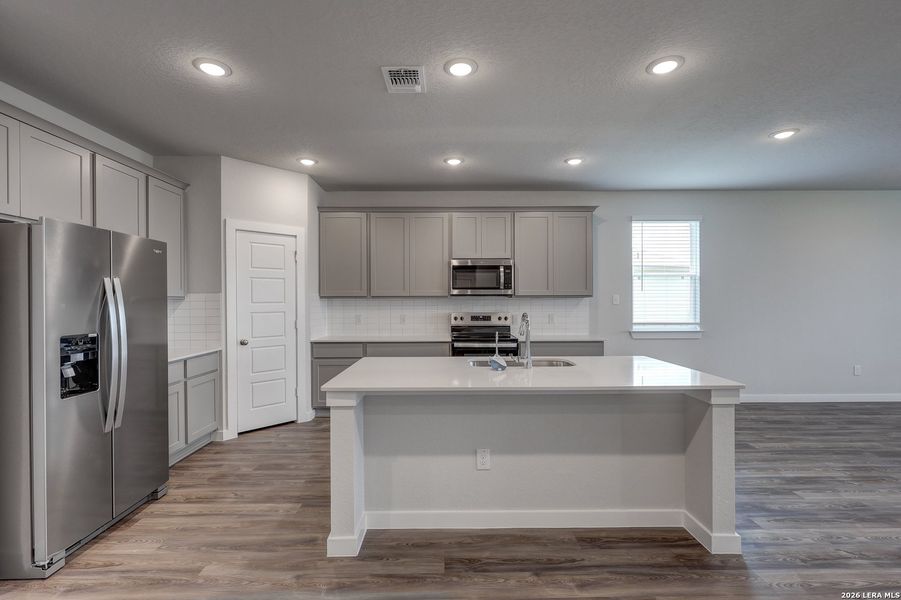 Furnished interior view inside a new home in Garden Grove, San Antonio (Image 6).