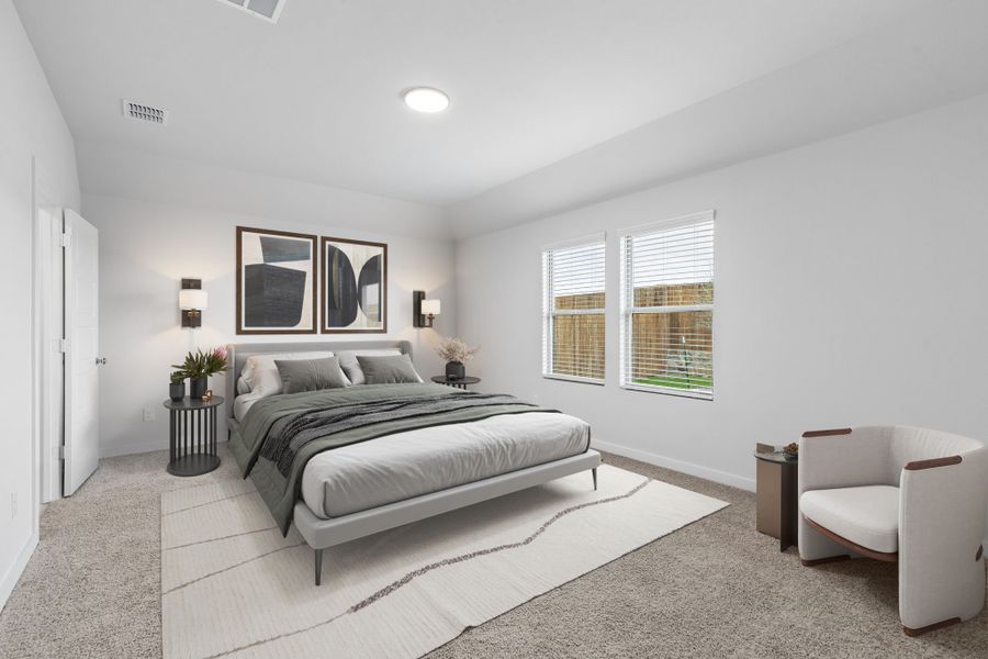 Primary Suite in the Oscar home plan by Trophy Signature Homes – REPRESENTATIVE PHOTO