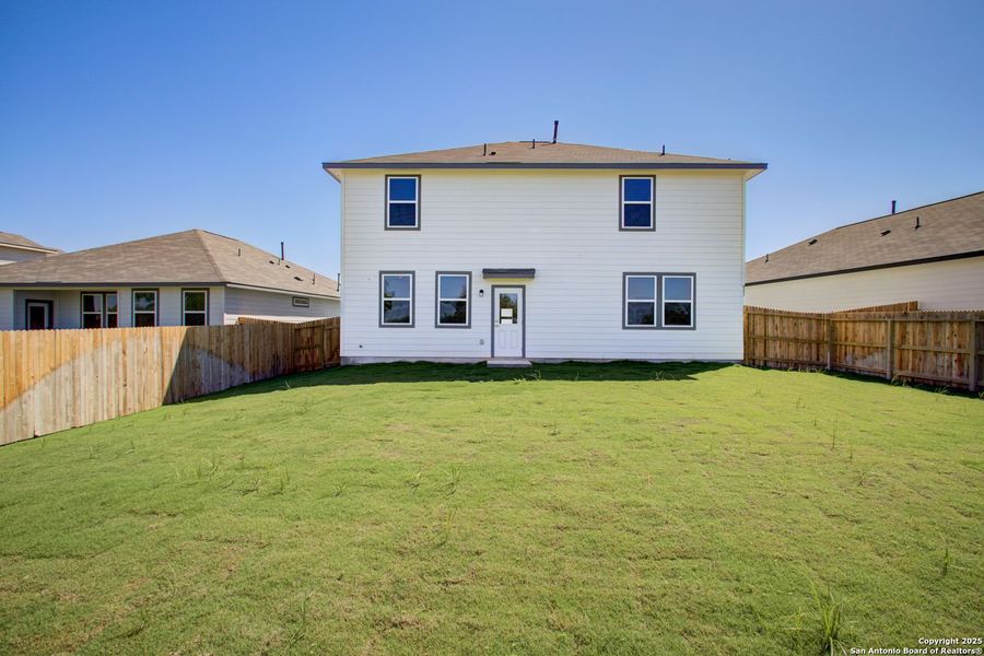 Front exterior of a new home in Hickory Ridge, San Antonio, TX, highlighting curb appeal (Image 71).