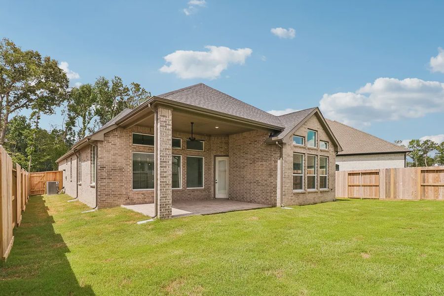 Exterior details and patio area of a home in Parkside on the River, Georgetown (Image 20).