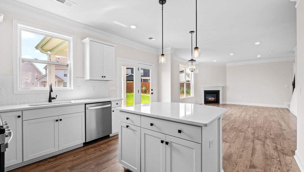 Representative furnished interior of a home built from the VERWOOD by D.R. Horton in Adams Glen, Greenville (Image 6).