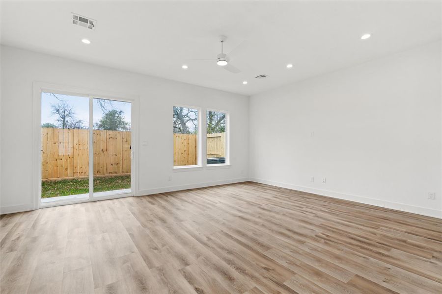 Spacious living area with backyard views and great natural light.
