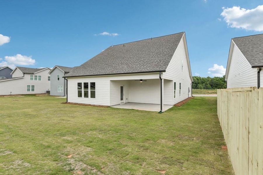 Exterior details and patio area of a home in Sutton’s Landing, Statham (Image 23).
