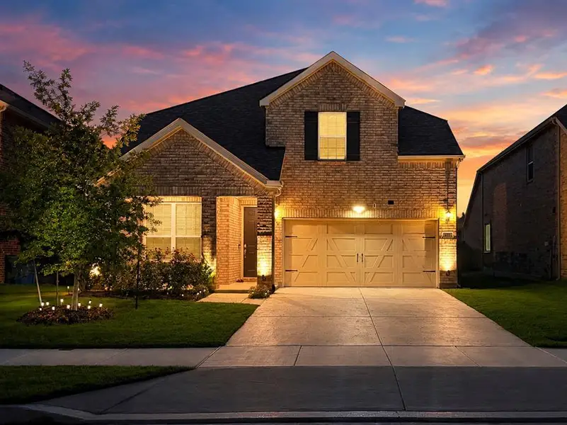 Front exterior of a new home in , Little Elm, TX, highlighting curb appeal (Image 26). Front exterior of a new home in , Little Elm, TX, highlighting curb appeal (Image 26).