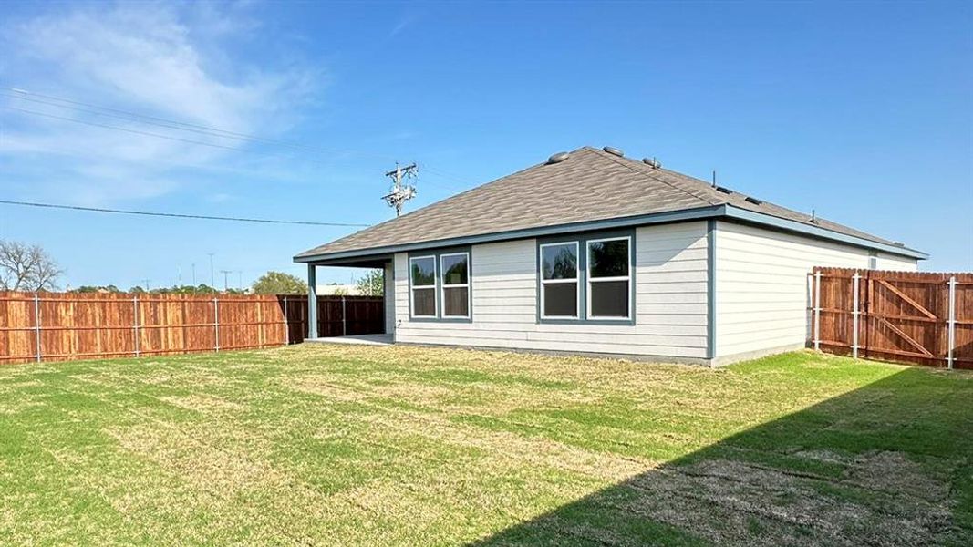 Exterior details and patio area of a home in Corsicana Commons, Corsicana (Image 2). Exterior details and patio area of a home in Corsicana Commons, Corsicana (Image 2).