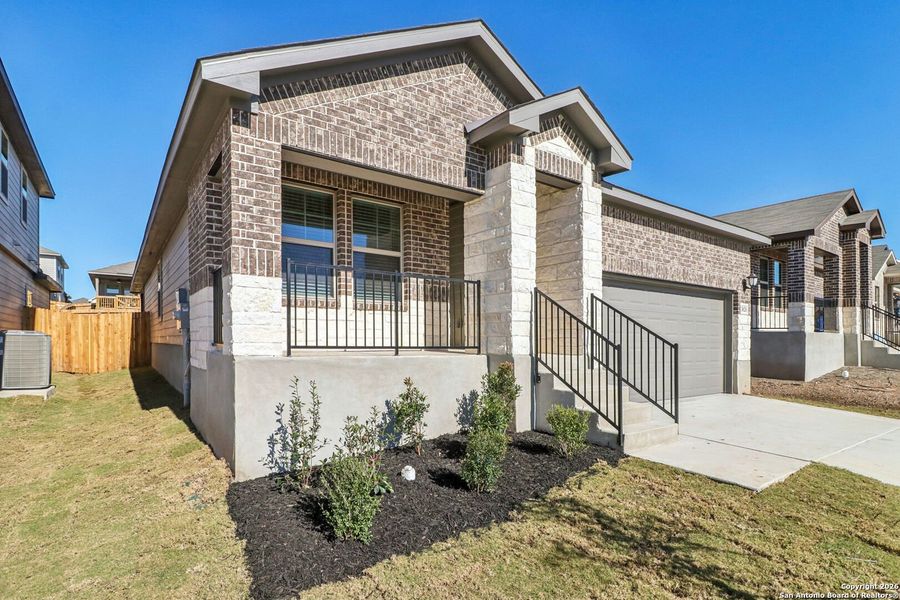 Exterior details and patio area of a home in Lark Canyon, New Braunfels (Image 23).
