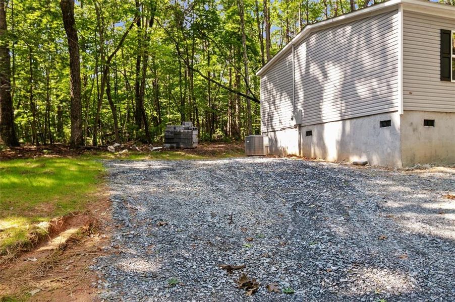 Exterior details and patio area of a home in , Ellijay (Image 19).