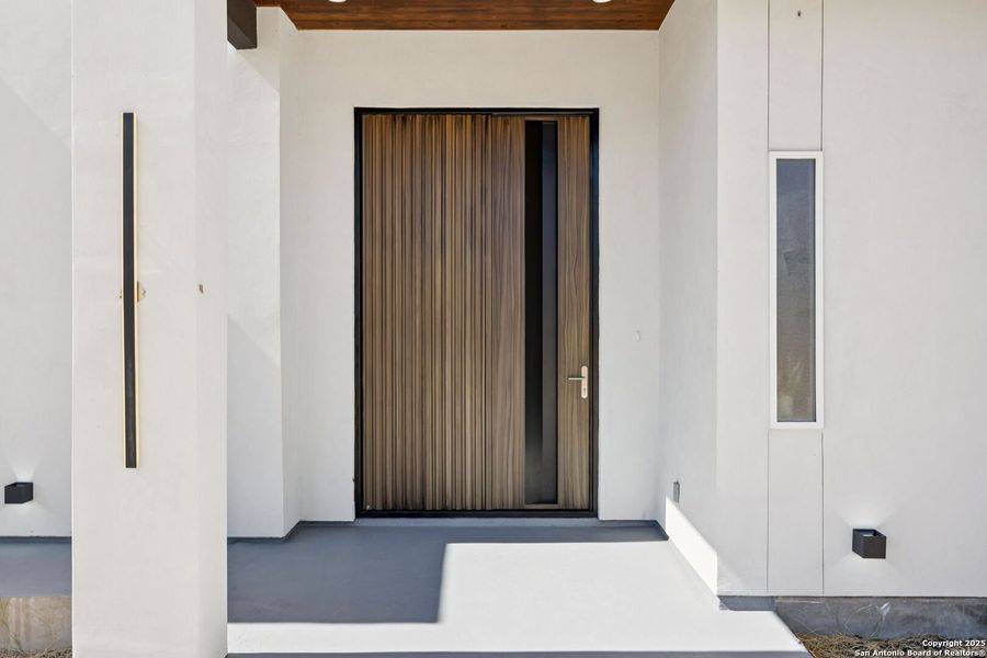 Exterior details and patio area of a home in , La Vernia (Image 33).