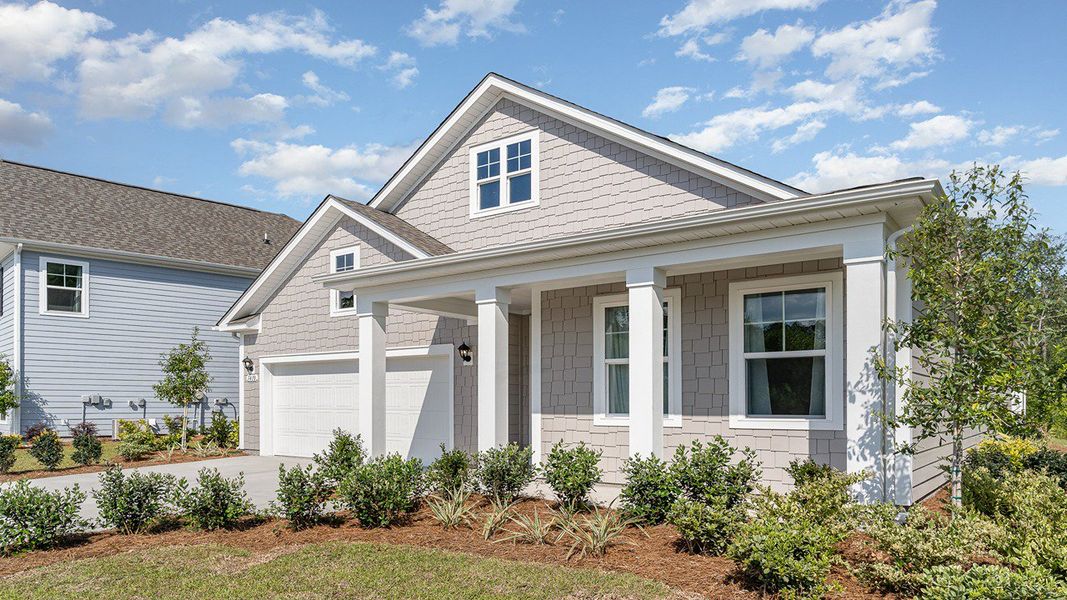 Representative exterior photo of a completed home built from the Darby by D.R. Horton in Heron Pointe, Myrtle Beach, SC (Image 26). Representative exterior photo of a completed home built from the Darby by D.R. Horton in Heron Pointe, Myrtle Beach, SC (Image 26).
