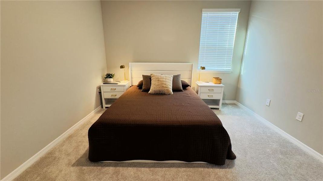 Furnished interior view inside a new home in Harvest at Ovation, Winter Garden (Image 58).