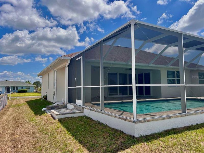 Exterior details and patio area of a home in , Rotonda West (Image 29).