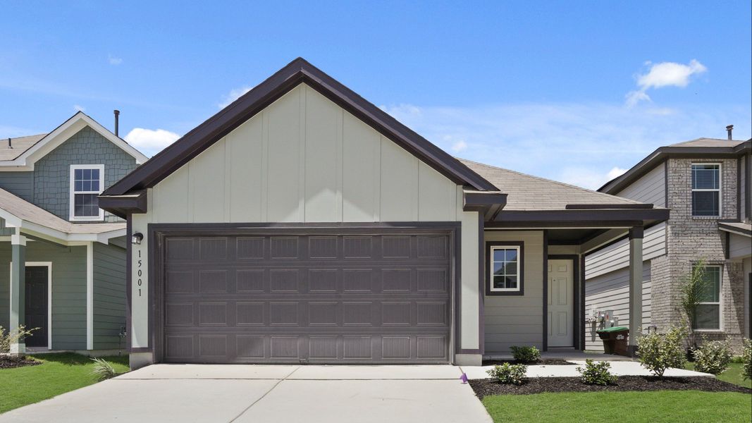 Front exterior of a new home in Timber Creek, San Antonio, TX, highlighting curb appeal (Image 1).