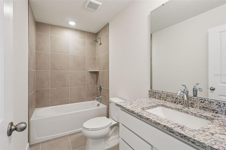 Furnished interior view inside a new home in Cyrene at Harmony, St. Cloud (Image 14).