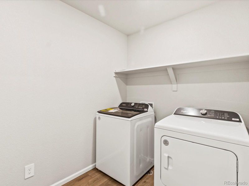 Furnished interior view inside a new home in Skyview at High Point, Aurora (Image 8).