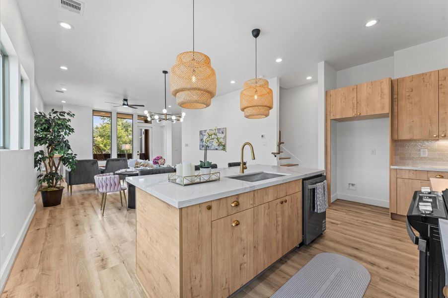 Open flow connecting kitchen, dining area and living room