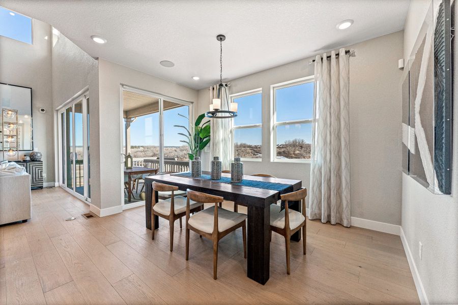 Representative furnished interior of a home built from the Roxborough by Taylor Morrison in Trailstone, Arvada (Image 11).