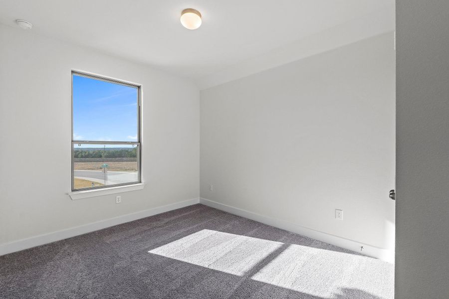 Spacious, unfurnished interior of a new home in Parmer Ranch, Georgetown (Image 36).