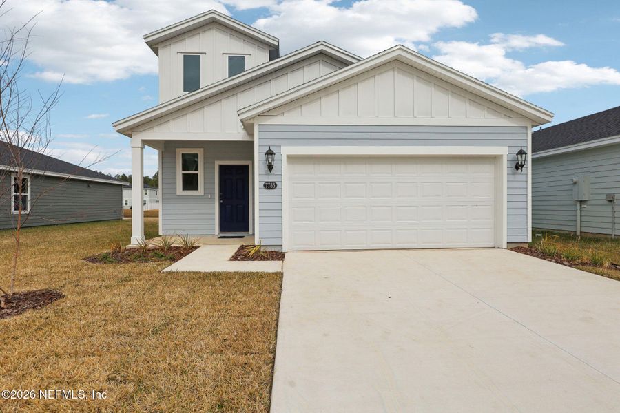 Front exterior of a new home in Kings Preserve, Jacksonville, FL, highlighting curb appeal (Image 1). Front exterior of a new home in Kings Preserve, Jacksonville, FL, highlighting curb appeal (Image 1).
