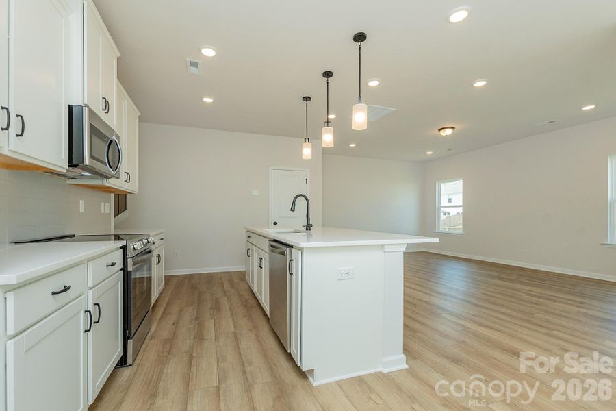 Furnished interior view inside a new home in Sunset Meadows, Charlotte (Image 7).