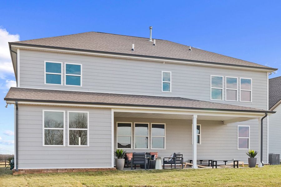 A house with a large front yard.