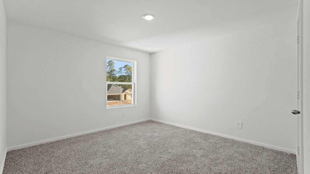 Representative unfurnished interior of a home built from the Midland by D.R. Horton in New Waverly Station, New Waverly (Image 22).